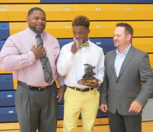 Coach Jones, Wilson Smith  Lee Carroll in a happy moment for all 